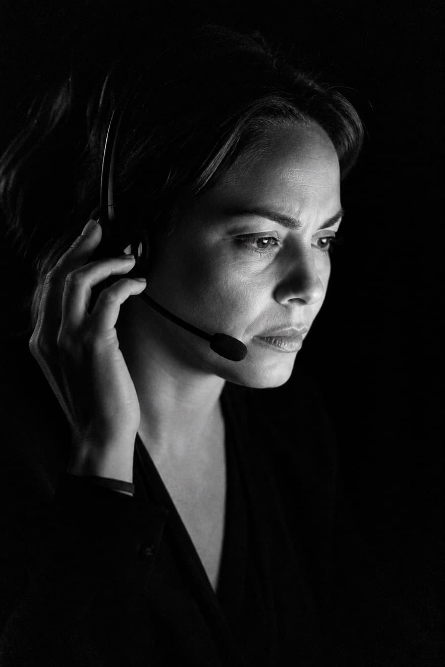 Agent listening closely, verifying details on a call